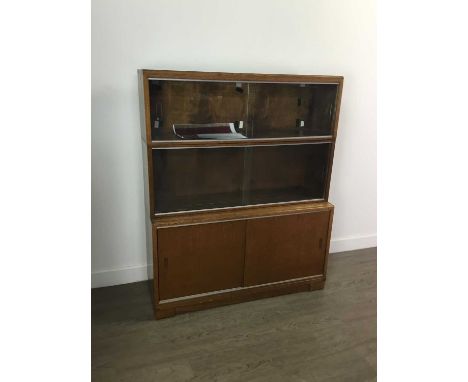 TWO MINTY STACKING BOOKCASES,each with base unit of wooden sliding doors and two further sliding glass door units plus a conn