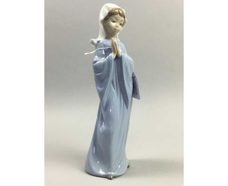 NAO FIGURE OF A PRAYING GIRL,28cm high, along with other figures including a Nao group of robed boy and dog, a Lladro figure 