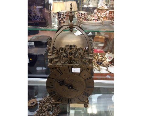 Lantern clock. A good late Victorian/early Edwardian large single train 30 hour movement. Anchor escapement striking on a bel