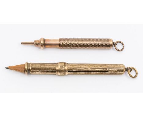 A Sampson Mordan &amp; Co 9ct gold pencil holder, engine turned decoration, length approx 80mm, weight approx 10.9gms along w