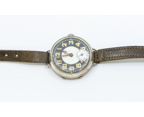 An Early 20th Century silver gents wristwatch, round dial with black and white enamel, lume numbers, subsidiary at 6, case ap