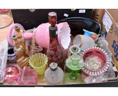 A collection of early to mid 20th Century glass wares, mostly coloured examples, ruby etched decanter, Venetian decorated gla