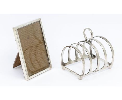 A George VI silver five bar toast rack, loop handle, hallmarked by Adie Brothers, Birmingham, 1937 and a plain rectangular sm