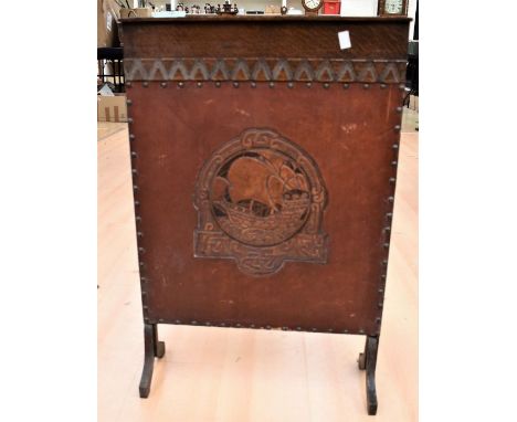 A mahogany Edwardian folding top games table, oak bedside pot cupboard, carved corner shelf and fire screen