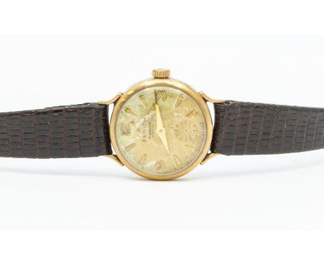 Zenith- a ladies Zenith 9ct gold wristwatch, round champagne dial with applied gilt number and arrow markers, subsidiary dial