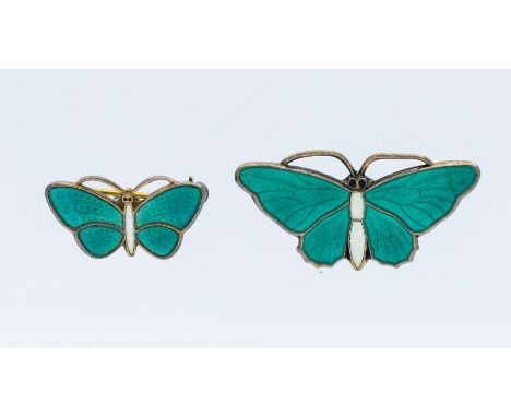 Askel Holmsen- a Modernist silver gilt and enamel brooch in the form of a butterfly, decorative emerald enamel wings with whi