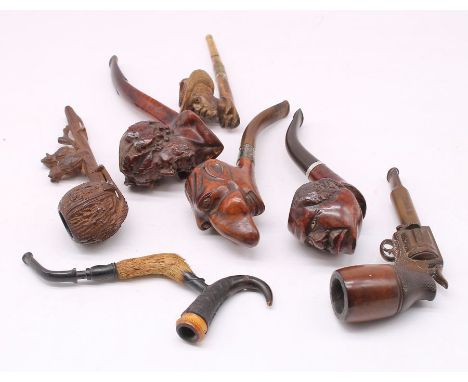 Novelty wooden pipes including a hand gun pipe