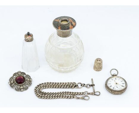 An early 20th century silver ladies pocket watch, white enamel dial with gilt decoration, subsidiary dial at 6, embossed case