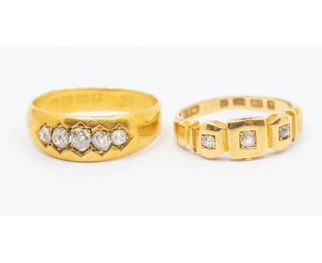 A Victorian diamond and 18ct gold ring, comprising five old mine cuts set in a row, size M, along with a diamond set three st