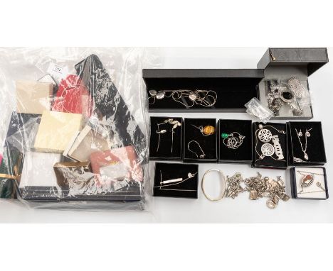 A large collection of silver and white metal jewellery including Victorian silver brooches, onyx and silver set bracelet, cro