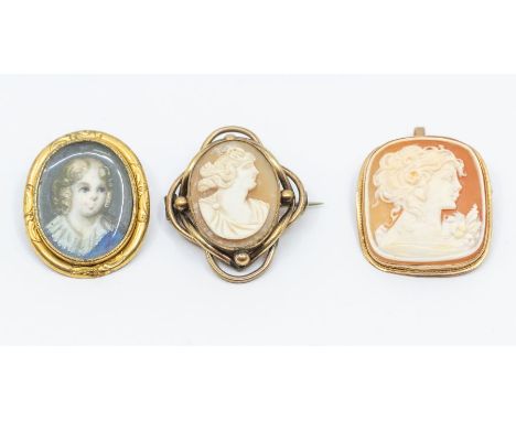 A 19th century yellow metal brooch, set with a portrait miniature on ivory depicting a young boy, approx 3.5cm x 2.8cm, unmar