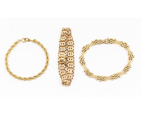 A yellow metal gate-link bracelet, unmarked assessed as approx 9ct, gross weight approx 22gms; a yellow metal fancy gate-link