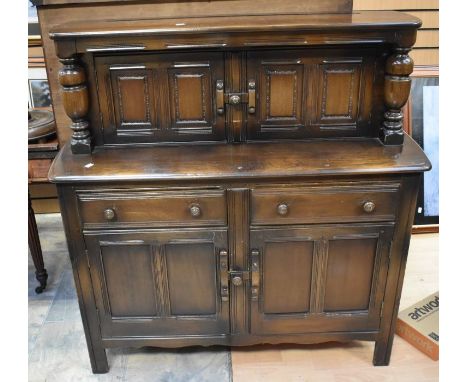 Reproduction dark wood court cupboard, mid-20th Century along with a standard lamp