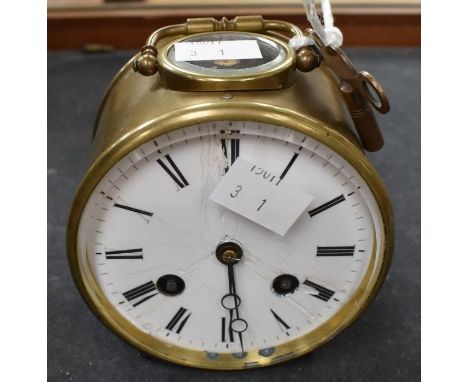 A small late Victorian French bedside clock or travelling clock with 2 train movement striking on a bell. Serial number 2174.