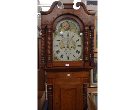 A late Victorian 8 day Longcase Clock By William James Davis of Harlech Wales. With 13" arch dial with moon phase in the arch