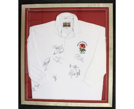 Rugby: A framed and glazed, 'England World Cup Winners 2003' 3XL shirt, signed by: Jonny Wilkinson, Matt Dawson, Martin Johns