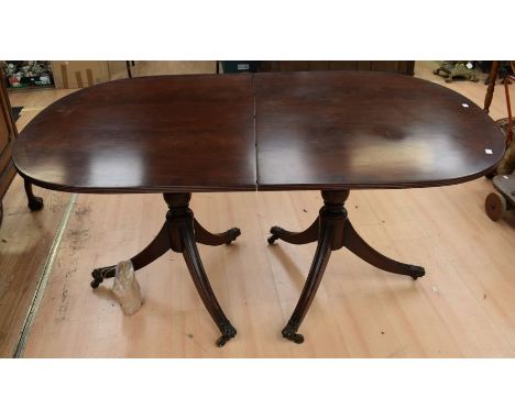 A reproduction mahogany d-end dining table (two leaves) together with a set of eight Chippendale style reproduction dining ch