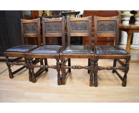A set of four late 20th Century rustic style darkwood chairs along with a small wooden bench