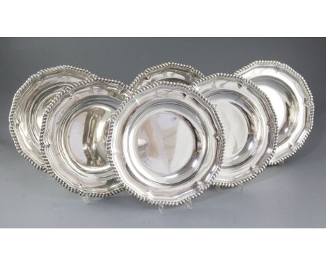 A rare and good set of six George IV silver soup plates, by Paul Storr, hallmarked London 1833/34, they are traditional in sh