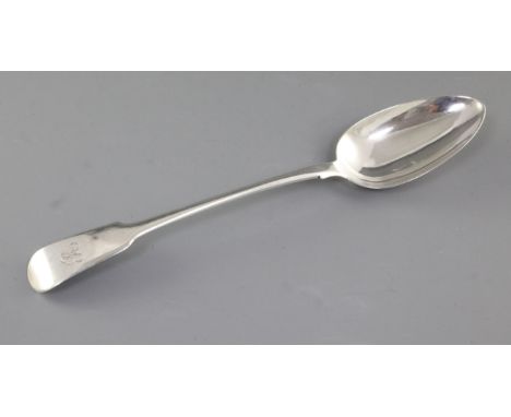 A George IV silver fiddle pattern basting spoon, by Thomas Wilkes Barker, hallmarked London 1824, initialled, Length 300mm We