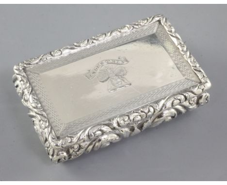 A George IV silver snuff box, by Thomas Shaw, hallmarked Birmingham 1825, of rectangular ogee form and decorated with bird an