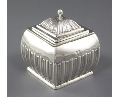 A Victorian demi fluted silver tea caddy and cover, by Stokes & Ireland, hallmarked for Birmingham, 1889, of square cushion f