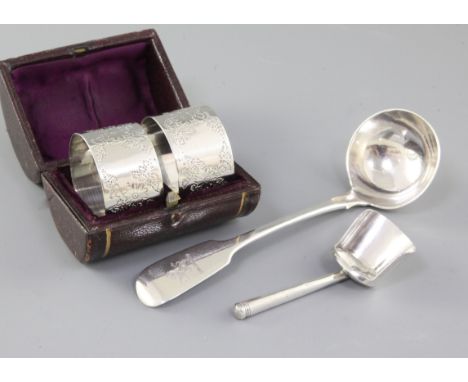 A George III silver caddy spoon, by Wardell & Kempson, of shovel form, with cannon shape handle, hallmarked for Birmingham 18