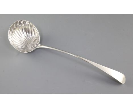 A George III silver Old English pattern soup ladle, by Walter Tweedie, hallmarked London 1777, with a scallop shell bowl, Len