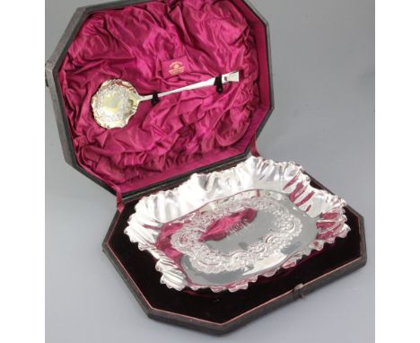 A cased late Victorian silver fruit set, by Rupert Favell, hallmarked London 1892, of shaped rectangular form and embossed wi