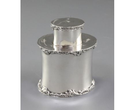 A Victorian silver tea caddy and cover, by Mappin & Webb, hallmarked Sheffield 1900, of oval form with cast and applied borde