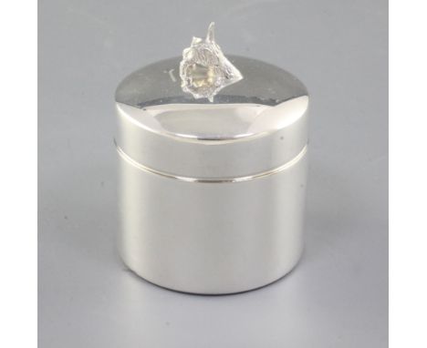 A modern silver novelty trinket box, by Theo Fennell, hallmarked for London, 2005, of cylindrical form, the lid modelled as a