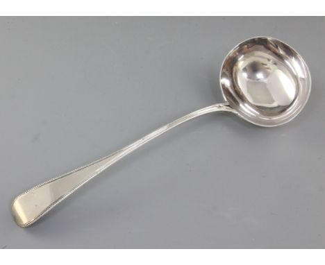 A George III silver Old English beaded pattern soup ladle, by Sarah & John William Blake, hallmarked London 1810, Length; 132