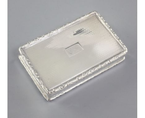 A William IV engine turned silver snuff box, by Edward Smith, hallmarked Birmingham 1831, of rectangular form, with cast and 