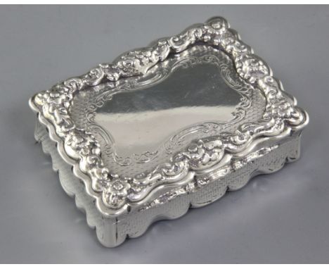 A Victorian silver rectangular table snuff box, by Yapp & Woodward, hallmarked Birmingham 1850, with cast and applied floral 