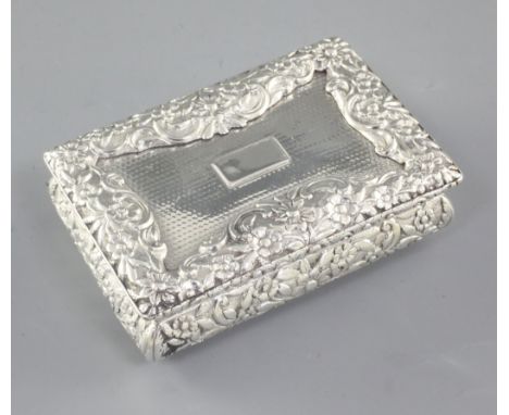 A William IV engine turned silver snuff box, by Nathaniel Mills, hallmarked Birmingham 1832, of rectangular ogee form, the ca