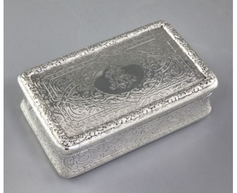 A large Victorian silver table snuff box, by Thomas Johnson I, hallmarked London 1869, of rectangular form, with chased and r