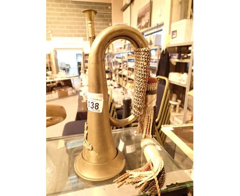 Royal Artillery bugle with badge and lanyard CONDITION REPORT: No provenance, we are not certain that this is an old piece an