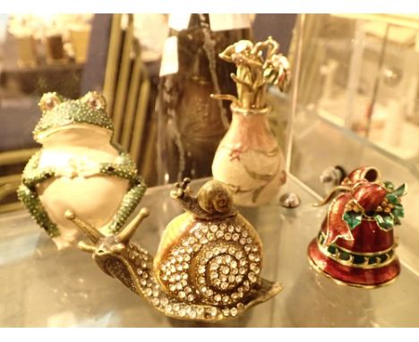 Four enamel and gilt trinket pots in the form of a bell snail frog and flowers in a vase 