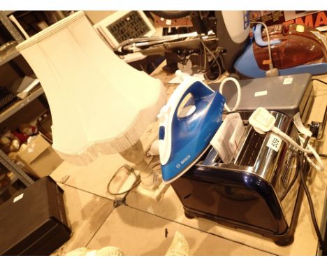 Morphy Richards four slice toaster and a Bosch steam iron CONDITION REPORT: All electrical items in this lot have been PAT te