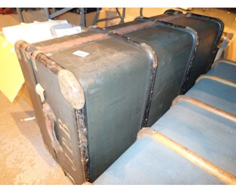 Vintage wood bound luggage trunk marked JPB