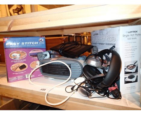 Shelf of electrical items including digital photo frame mini sewing machine etc  CONDITION REPORT: All electrical items in th