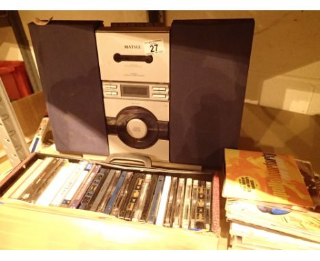 Matsui radio CD tape player with box of tape and CDs  CONDITION REPORT: All electrical items in this lot have been PAT tested