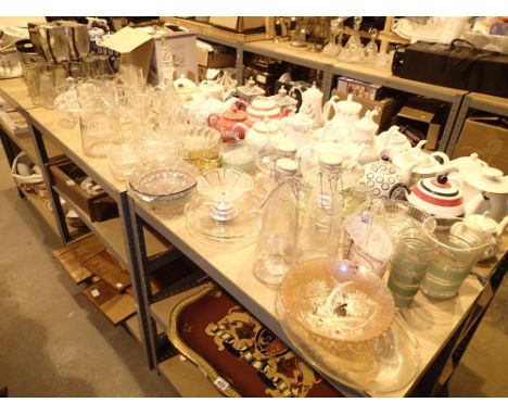 Shelf of mixed glassware including a Tetley jug and Guiness glasses 