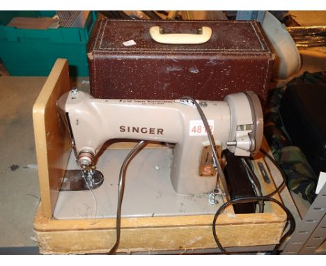 Cased electric Singer sewing machine 185K  CONDITION REPORT: All electrical items in this lot have been PAT tested for safety