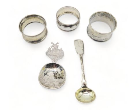 &nbsp;A Dutch silver caddy spoon, with import marks for&nbsp;Hernu, Peron &amp; Stockwell Ltd, London, three silver napkin ri