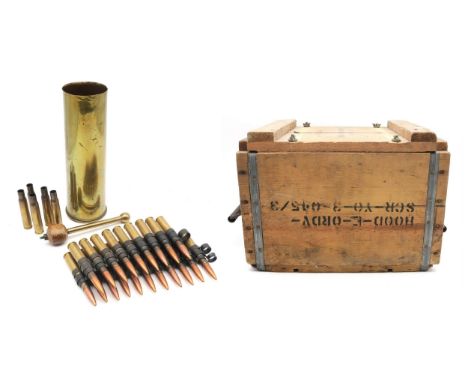A large brass artillery shell with gong beater and a pine ammunition crate, containing a quantity of spent and inert rounds C