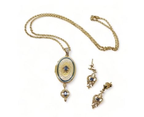 A 14k gold Royal Doulton locket. Pattern name 'Eleanor' a limited edition of 534/750, set with sapphires, with a diamond set 