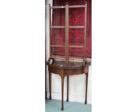 A lot comprising a 20th century mahogany demi lune fold over card table, 74cm high x 77cm wide x 38cm deep and three fold tow
