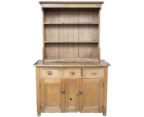 A lot comprising a Victorian pine kitchen cabinet with one long and on short drawers over pair of panelled doors on turned fe