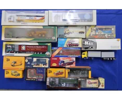 A collection of boxed scale model die-cast vehicles, to include the Corgi Classics and Heavy Haulage series and a Man Truckno